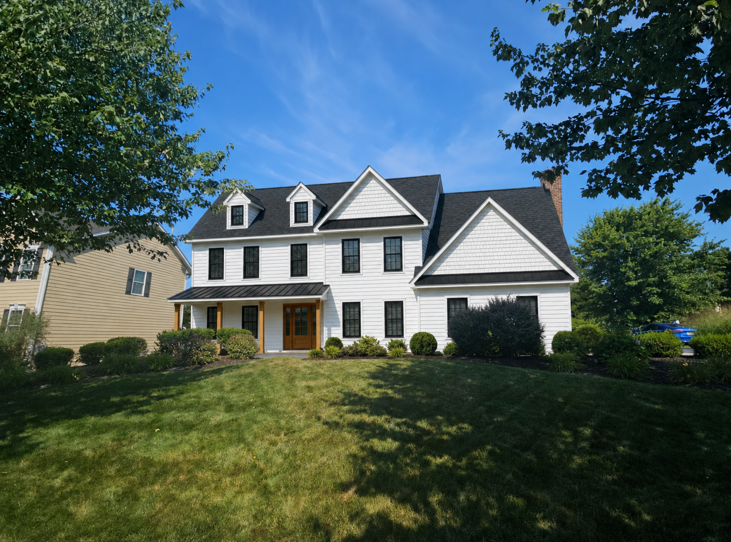 Finished design visualization with white siding and black windows